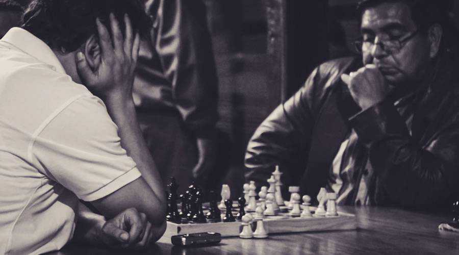 chess players black white focus designer