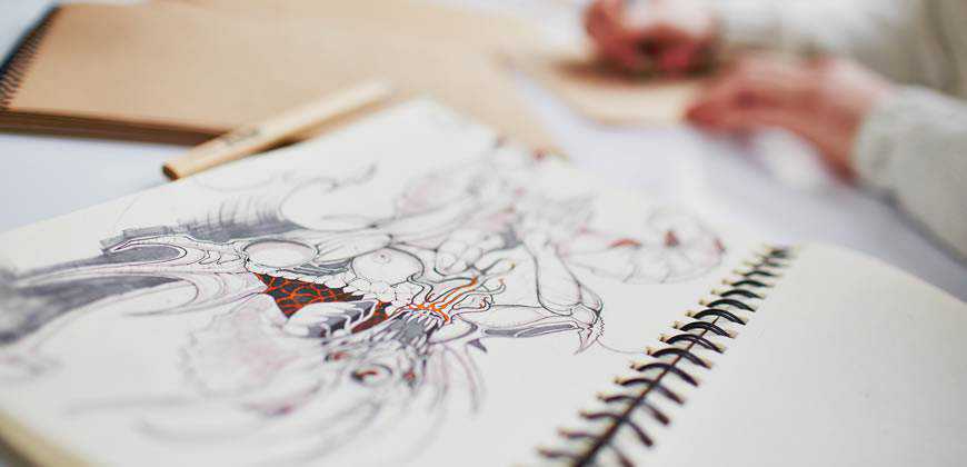 designer sketching notebook